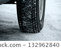 Traces of tread blocks of winter tires under off road vehicle Traces of tread blocks of winter tires under off road vehicle 132962840