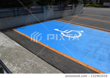 Wheelchair mark caring parking lot 132963038