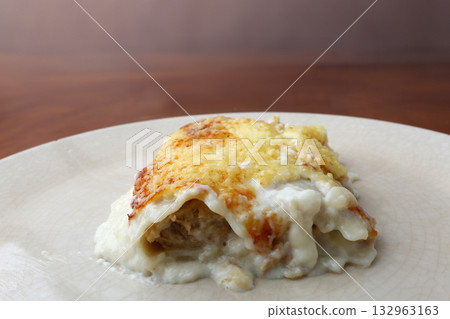 Homemade Baked Cannelloni with Cheese and Sauce 132963163