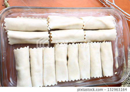Homemade Baked Cannelloni with Cheese and Sauce 132963164