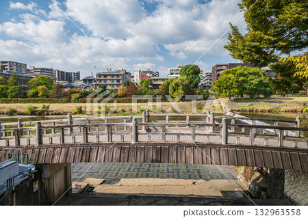 A bridge over the Lake Biwa Canal's cold spring outlet, which flows into the Kamo River, Kyoto City A bridge over the Lake Biwa Canal's cold spring outlet, which flows into the Kamo River, Kyoto City 132963558