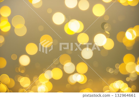 一幅抽象背景，散發著夢幻般的金色光芒。 132964661