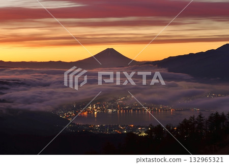 Mount Fuji and Lake Suwa at dawn as seen from Takabocchi Plateau 132965321