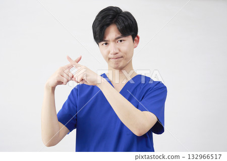 Doctor, nurse, dentist, caregiver male cross gesture white background 132966517