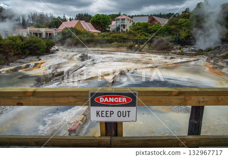 Danger area in Whakarewarewa the living Maori village in Rotorua, New Zealand. This is a living Maori village known for its active geothermal landscape. 132967717