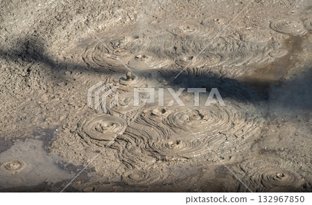The boiling Mud pools in Rotorua, New Zealand's geothermal wonderland. Mud is boiled either for geothermal activity, where rising gases and steam heat water to create naturally boiling mud pots. The boiling Mud pools in Rotorua, New Zealand's geothermal wonderland. Mud is boiled either for geothermal activity, where rising gases and steam heat water to create naturally boiling mud pots. 132967850
