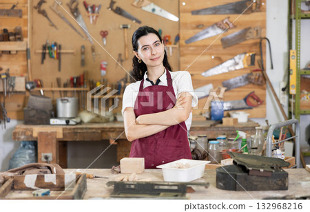 Young girl posing in taller workshop 132968216
