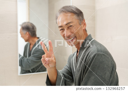 Smiling senior man in the bathroom Smiling senior man in the bathroom 132968257