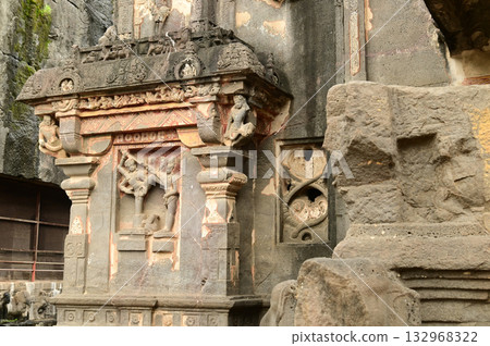 Ellora Caves, Ancient Hindu Rock Temples Ancient Hindu temples (Kailash Mandir and the chariot built to worship Lord Shiva) carved out of solid rock. Cave 16, Ellora Caves, near Aurangabad, India. 132968322