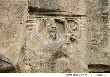 Ellora Caves, Ancient Hindu Rock Temples Ancient Hindu temples (Kailash Mandir and the chariot built to worship Lord Shiva) carved out of solid rock. Cave 16, Ellora Caves, near Aurangabad, India. 132968323