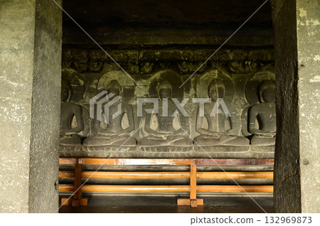 The religious sites and art at the Elora Caves,a UNESCO World Heritage Site,are one of the world's largest collections of rock-cut temples, dating back to 600-1000 AD. Located at Aurangabud in India. The religious sites and art at the Elora Caves,a UNESCO World Heritage Site,are one of the world's largest collections of rock-cut temples, dating back to 600-1000 AD. Located at Aurangabud in India. 132969873