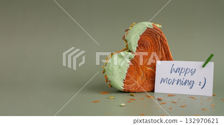 HAPPY MORNING saying card Delicious fresh croissant topped with Matcha Green Tea flavor Ganache. Creation unique heart shape bakery. Puff pastry holiday love gift present idea Valentine's day 132970621