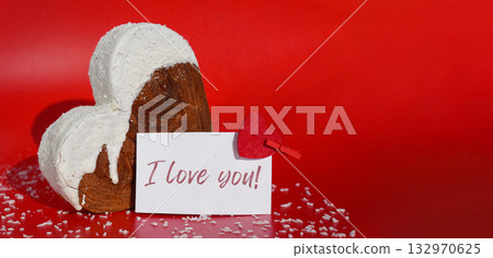 Valentine's Day proposal I LOVE YOU wishes saying caption on greeting card Delightful heartshaped pastry croissant treat, beautifully topped with colorful frosting galore. Copy space. Food Valentine's Day proposal I LOVE YOU wishes saying caption on greeting card Delightful heartshaped pastry croissant treat, beautifully topped with colorful frosting galore. Copy space. Food 132970625