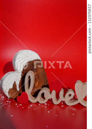 Word Love decor greeting card Delicious fresh croissant topped with colorful flavor Ganache. Creation unique heart shape bakery. Puff pastry holiday love gift present idea Valentine's day Word Love decor greeting card Delicious fresh croissant topped with colorful flavor Ganache. Creation unique heart shape bakery. Puff pastry holiday love gift present idea Valentine's day 132970657