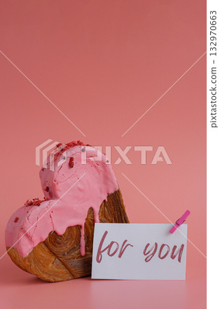 FOR YOU caption text on paper note holiday gift present Heart shaped strawberry berry croissant on pink background with copy space. Puff pastry new trendy sweet dessert bakery. Creamy dough FOR YOU caption text on paper note holiday gift present Heart shaped strawberry berry croissant on pink background with copy space. Puff pastry new trendy sweet dessert bakery. Creamy dough 132970663