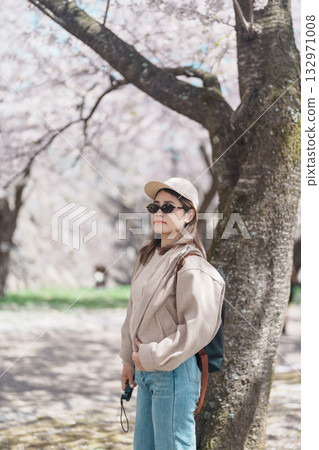 Woman tourist sightseeing Sakura Cherry blossom at Morioka Castle Ruins park in Spring, happy traveler travel in Iwate Park, Iwate prefecture, Japan. famous Landmark Travel and Vacation destination Woman tourist sightseeing Sakura Cherry blossom at Morioka Castle Ruins park in Spring, happy traveler travel in Iwate Park, Iwate prefecture, Japan. famous Landmark Travel and Vacation destination 132971008