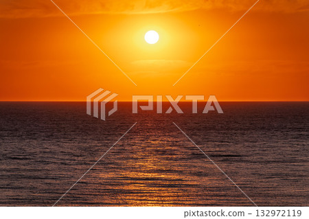 Beautiful red and orange sunrise over the sea. 132972119
