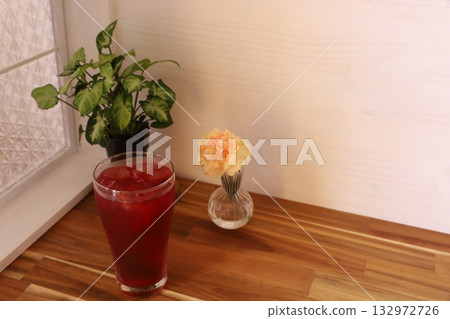 A vibrant red drink 132972726