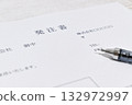 A Japanese business document with the heading "Purchase Order" and a pen 132972997