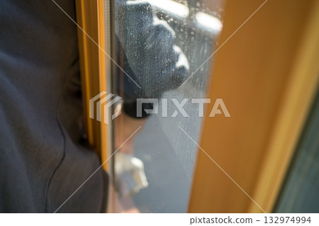 Housewife cleaning windows Housewife cleaning windows 132974994