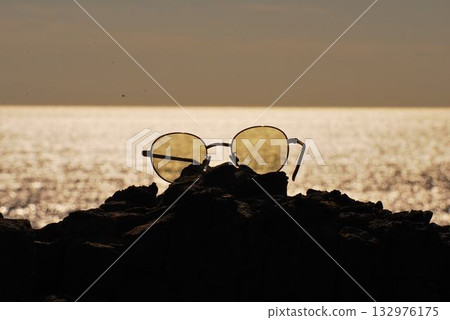 Sunglasses on the beach 132976175