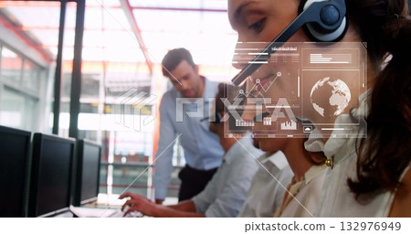 Listening agent wearing headset handling call at call center, with digital overlay, copy space 132976949