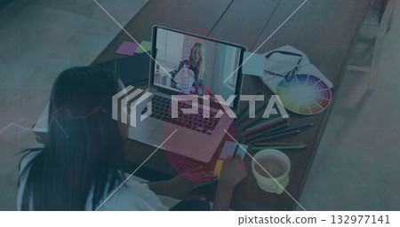 Mixing colors woman joining design meeting in home office, with laptop, design tools and coffee mug Mixing colors woman joining design meeting in home office, with laptop, design tools and coffee mug 132977141