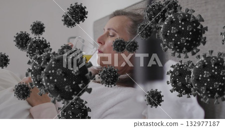 Reclining woman wearing bathrobe sipping orange juice in bedroom with floating viruses, copy space Reclining woman wearing bathrobe sipping orange juice in bedroom with floating viruses, copy space 132977187