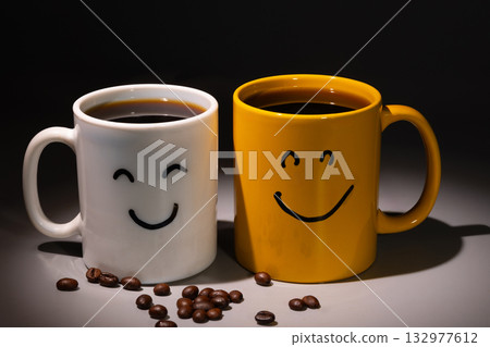 Morning Coffee With Happy Faces Painted on Mugs Brings a Cheerful Day Morning Coffee With Happy Faces Painted on Mugs Brings a Cheerful Day 132977612