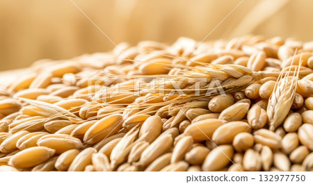 Macro of wheat grains and spikes for concept of agriculture, harvest, food, or baking 132977750