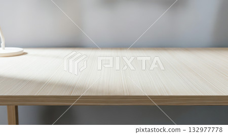 Empty wooden desk on gray background for mockup, or concept of home office, work, or study 132977778