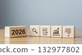 2026 business concept, wooden blocks, search, plan, growth, AI icons, future strategy, new year resolution, corporate planning, desk background 132977802