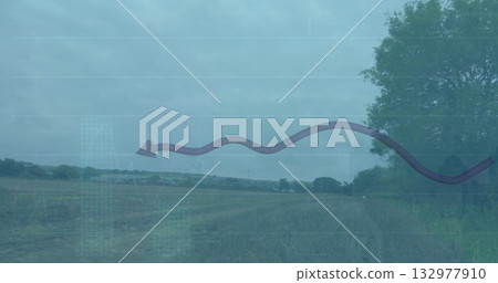 Spanning field under cloudy sky on farm, hedgerows, mowed stubble, faint dirt track, solitary tree 132977910
