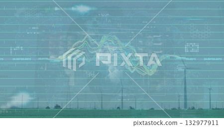 Showing wind turbines spinning on green grass field, displaying grid lines and numeric overlays 132977911