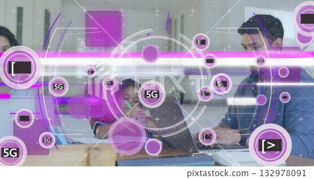 Working family of three typing on laptops and writing notebook at kitchen table, with 5G overlays 132978091