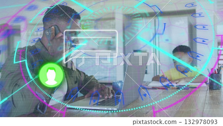 Father in jacket using smartphone, typing on laptop at home, with son writing notebook, AR overlay 132978093