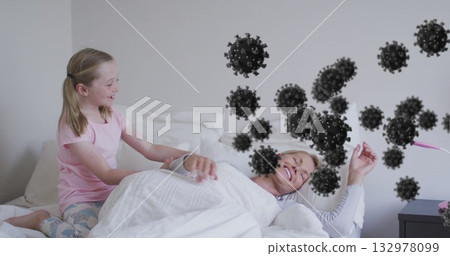 Resting mother in striped top, daughter pulling blanket in bedroom with virus icons and thermometer 132978099