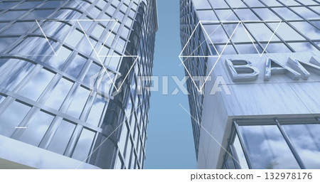 Adjacent glass-clad tall towers rising at street level, with bank podium BA and white line graphics Adjacent glass-clad tall towers rising at street level, with bank podium BA and white line graphics 132978176