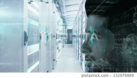 IT engineer examining code streams in data center corridor, with server racks, copy space 132978989