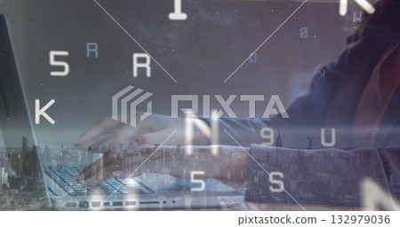 Working woman in business jacket typing on laptop at desk, with floating characters, city skyline 132979036