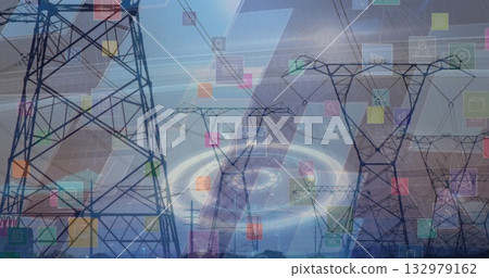 Extending transmission towers and power lines over fields showing colored holographic overlays 132979162