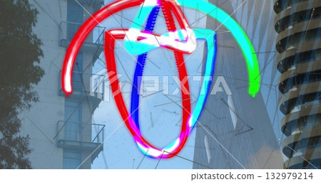 Displaying neon light trails swirling across glass pane over city skyline, reflecting urban energy 132979214