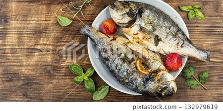 Roasted whole sea bream fish or dorado. Roasted whole sea bream fish or dorado. 132979619