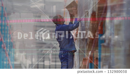 Reaching warehouse worker wearing blue coveralls grabbing box on high metal rack, chart overlay 132980038