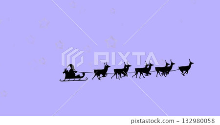 Gliding Santa Claus silhouette guiding sleigh through night sky, with seven reindeer and stars 132980058