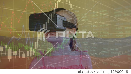 Standing child wearing pink top and black VR headset in trading simulation with candlestick charts Standing child wearing pink top and black VR headset in trading simulation with candlestick charts 132980648