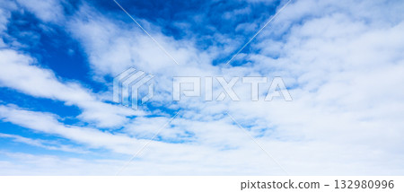 A simple landscape of blue sky and clouds A simple landscape of blue sky and clouds 132980996