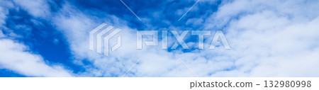 A simple landscape of blue sky and clouds A simple landscape of blue sky and clouds 132980998