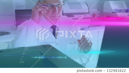 Adjusting eyeglasses researcher interpreting waveforms behind digital display in lab, with printers Adjusting eyeglasses researcher interpreting waveforms behind digital display in lab, with printers 132981622