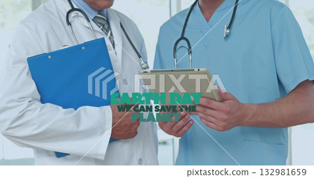 Standing doctors wearing uniforms holding tablet and stethoscopes in clinic, Earth Day text overlay 132981659